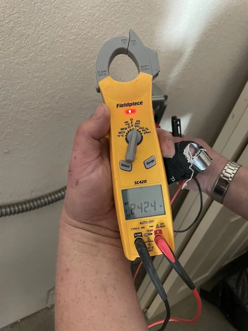 Voltage testing with clamp meter during Aluminum Wiring Replacement in Bay Minette